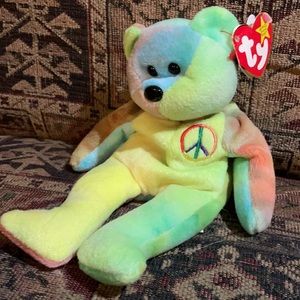 Sad looking Peace beanie baby wants a new home!